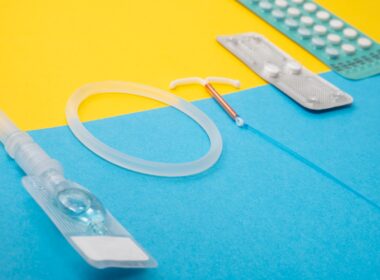 a medical device is laying on a blue and yellow surface