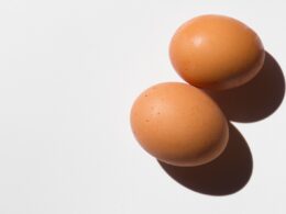 2 brown egg on white surface
